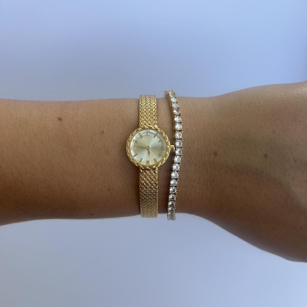 Teksturyzowany złoty zegarek Solenne